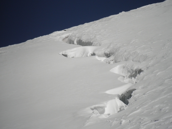 The snow gave way on me crossing a crevasse like this one. I yelled and Yannick ran forward so there was no slack in the rope and I did not go down further than my thighs.